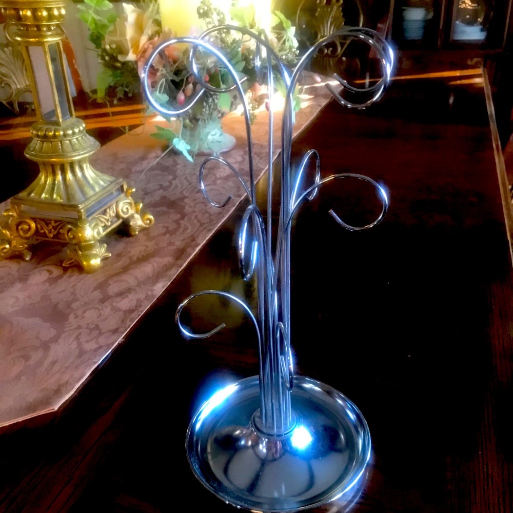 Necklace holder . Holds several chains